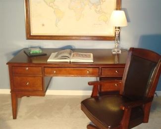 Bedroom #3/Office: Set up your home office with this HOME MERIDIAN desk. This desk features one file drawer on left, two drawers on the right and a pull-out keyboard drawer in the middle. It measures 60 inches wide x 30 inches deep by 29 inches high.  The office chair is priced separately from the desk.