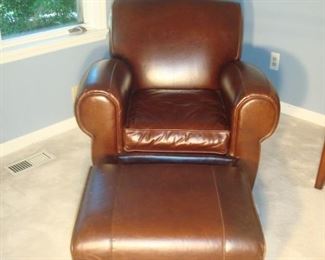 Bedroom #3/Office: This like new “leather” tight -back chair and ottoman are from POTTERY BARN.