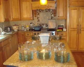Kitchen: Welcome to the kitchen and  get ready to entertain—all the plates you will need to host a buffet and more!  (There are 45 clear 8" plates and 45 clear 10" plates.  Each is individually priced, so buy as many as you need!)
