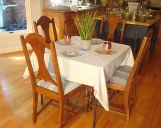 Kitchen: Don’t miss out on these four vintage chairs. 