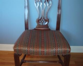 Dining Room:  This is a closer view  of one of the six Chippendale-style dining room side chairs which are included in the price of the table.