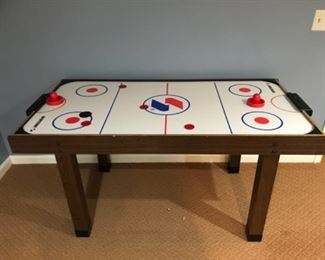Lower Level: Here’s you opportunity to perfect your air hockey game with this SPORTCRAFT air hockey table which is 59 inches wide x 30 inches deep.