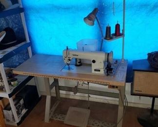 1018
Brother Sewing Machine And Sewing Table
Table Measures Approx: 48" x 20" x 30"