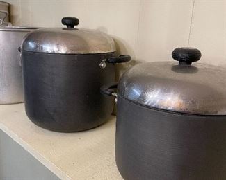 Stock pots with lids.