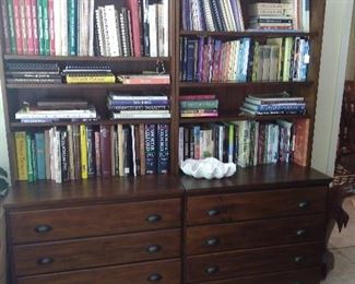 Pottery Barn office bookshelves with 2 lateral drawers each. Books, pottery, porcelain.