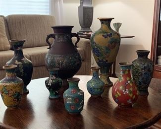 Chinese vases include bronze and champleve enamel vase and cloisonne vases.  Depending on vase, values from $35 - $170.  Vases are on antique Thonet table (glass top included), valued at $225.