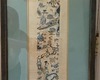 Chinese Panel, silk embroidery using the forbidden stitch depicting Chinese figures on a path by the stream with flowers, fishes and trees. Mid19th century, size is 6 x 21 inches. Frame is 13 x 29 inches. Valued at $175