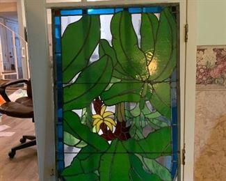 Oops  Upside down. Oh well.  Large custom made stained glass panel of our Cuban banana tree from 1957/8.  
