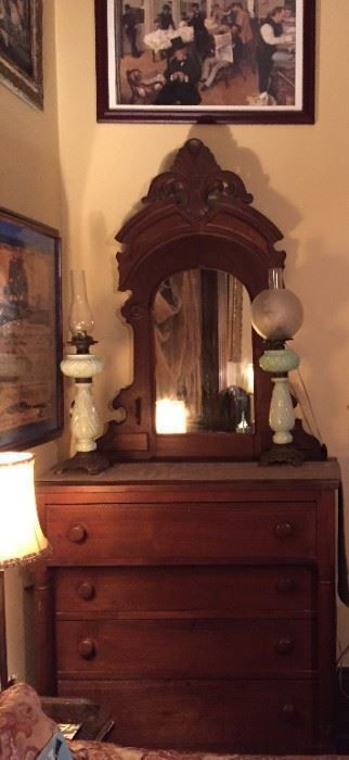  elegant antique gentleman's dresser 1800s, Simple elegant w\elaborately decorated mirror.   Lovely patina.  A treasure for your bedroom 
same family since purchased