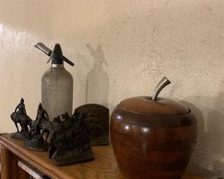 Hammacher Sclemmer vintage siphon bottle with cartridge sleeve and gorgeous Vintage apple ice bucket with lovely pattern. Both would be interesting conversation pieces for your bar.