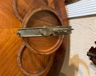 Vintage Hand made  carved wood trays, 3 tier fold up stand with footed brass frame.  carved  pattern on trays,  different carving on front and back when folded up.                Unique conversation Piece.  will be the envy of your dinner  guests when serving hors d'oeuvres
UNIQUE: Only found one like this on extensive Internet search
