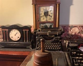 Hand made butter churn, Underwood typewriters, antique clocks and more
