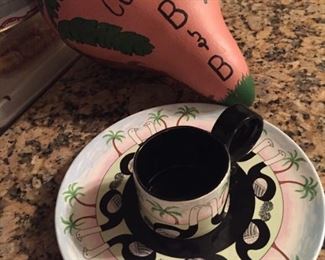 Candace Loheed collectible plates & mugs set of 4
You'll enjoy serving tea, expresso or coffee and pastries to your friends on the unique, fun cups with matching plates, set of 4. Or maybe your children or grandchildren can play grownup and enjoy a meal on them and a cup of juice or tea. ALSO great display conversation items on a shelf. Candace Loheed, Imports San Francisco 1979 made in Japan. Never used. Darling Pattern is of lovebirds, or maybe Ostriches and Palm Trees. These have original tag on bottom. 
      MORE available of these. Let me know what you need.
 