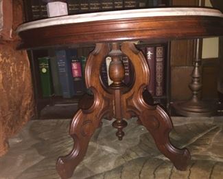 Marble-Top Oval Center or side Table, 1800s: Victorian Carved Walnut, Beveled Carrara marble, 2 skirt apron

