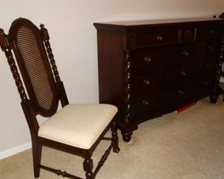 SIDE VIEW OF TOMMY BAHAMA DRESSER AND VIEW OF TWO DINING CHAIRS