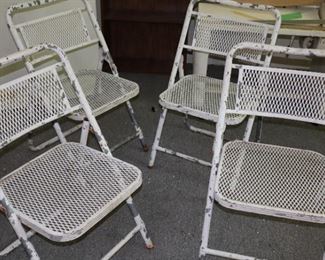 Set of four vintage aluminum chairs 