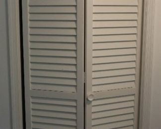 Many different wooden louver doors