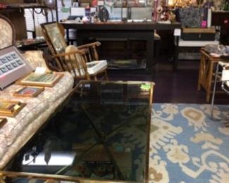 Glass top brass coffee table, black table & 6 matching white Naugahyde chairs