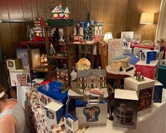 YALL!!!! This is supposed to be the master bedroom, however it was the largest usable room so now it is Dept 56 PALOOZA!!! We have displayed some of our favorites but there is no way to display them all.