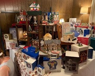 YALL!!!! This is supposed to be the master bedroom, however it was the largest usable room so now it is Dept 56 PALOOZA!!! We have displayed some of our favorites but there is no way to display them all. 