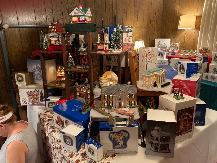 YALL!!!! This is supposed to be the master bedroom, however it was the largest usable room so now it is Dept 56 PALOOZA!!! We have displayed some of our favorites but there is no way to display them all. 