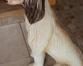 Tall statue of an Afghan hound.