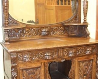 Large sideboard/bar with mirror and side shelves. Beautifully carved.