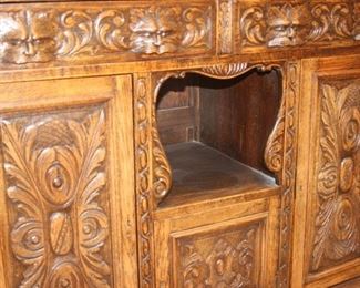 Large sideboard/bar with mirror and side shelves. Beautifully carved.
