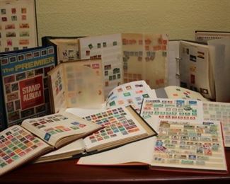 Multiple stamp albums and first day covers.