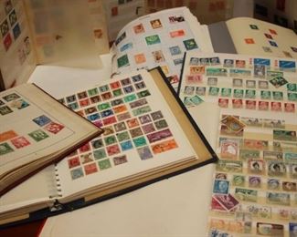 Multiple stamp albums and first day covers.