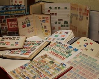 Multiple stamp albums and first day covers.