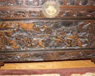 Asian themed carved trunk.