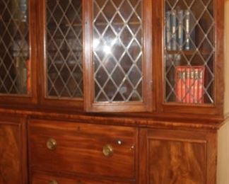 Large breakfront/bookcase/secretary. With leaded glass.