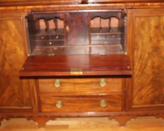 Large breakfront/bookcase/secretary. With leaded glass.