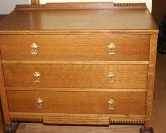 Three drawer English honey oak chest.