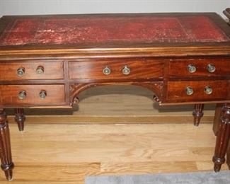 Leather inlaid writing desk.