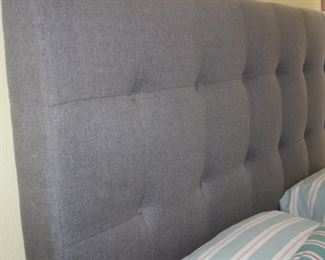 Brand new tweed like fabric king size headboard.