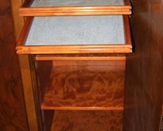 Tall silver and table linen cabinet.