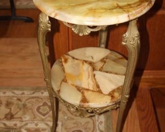 Onyz and metal two tiered table.