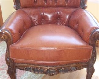 One of two beautiful leather armchairs and sofa with lumbar support and deep buttons