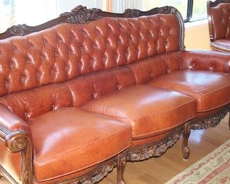 One of two beautiful leather armchairs and sofa with lumbar support and deep buttons