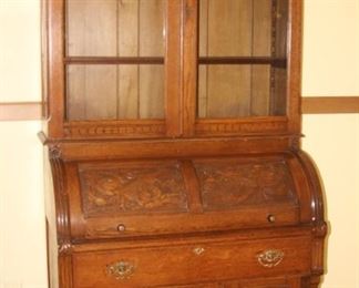 Tall cylinder desk/bookcase/curio.