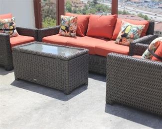 Hampton Bay resin patio set with armchairs, sofa and storage trunk/table.