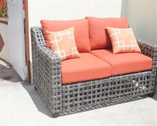 Hampton Bay resin loveseat.