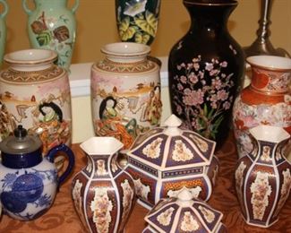 Asian themed pieces. Vases, urns, plates and teapots.