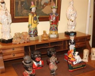 Asian figures and antique coin banks.