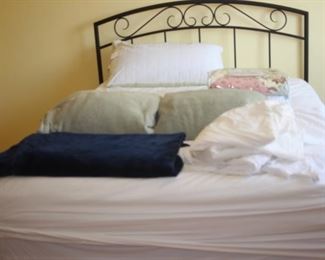 Queen size bed with iron headboard,