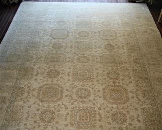 $3,500  Hand woven silk Persian rug in light blue and cream tone 9’ x 12’