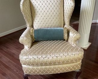 $350  Custom upholstered wing chair, in cream with raised velvet teal blue polka dots 31” l x 24” w x 45” h