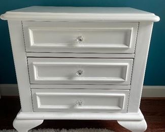 $250 - White 3-Drawer Nightstand features crown molding and four curved feet for a classic silhouette - 24” l x 16” w x 26” h 